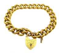 Early 20th century gold curb link bracelet with heart locket, stamped 9ct, approx 15.