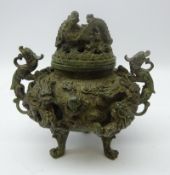 Chinese bronze Koro, cast in relief with Dragons with conforming pierced cover,