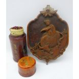 Chinese bamboo fortune sticks in cylindrical leather case and Chinese red lacquer shaped plaque