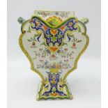 Early 20th century two handled Delft vase, of tapered form painted with Polychrome enamels,