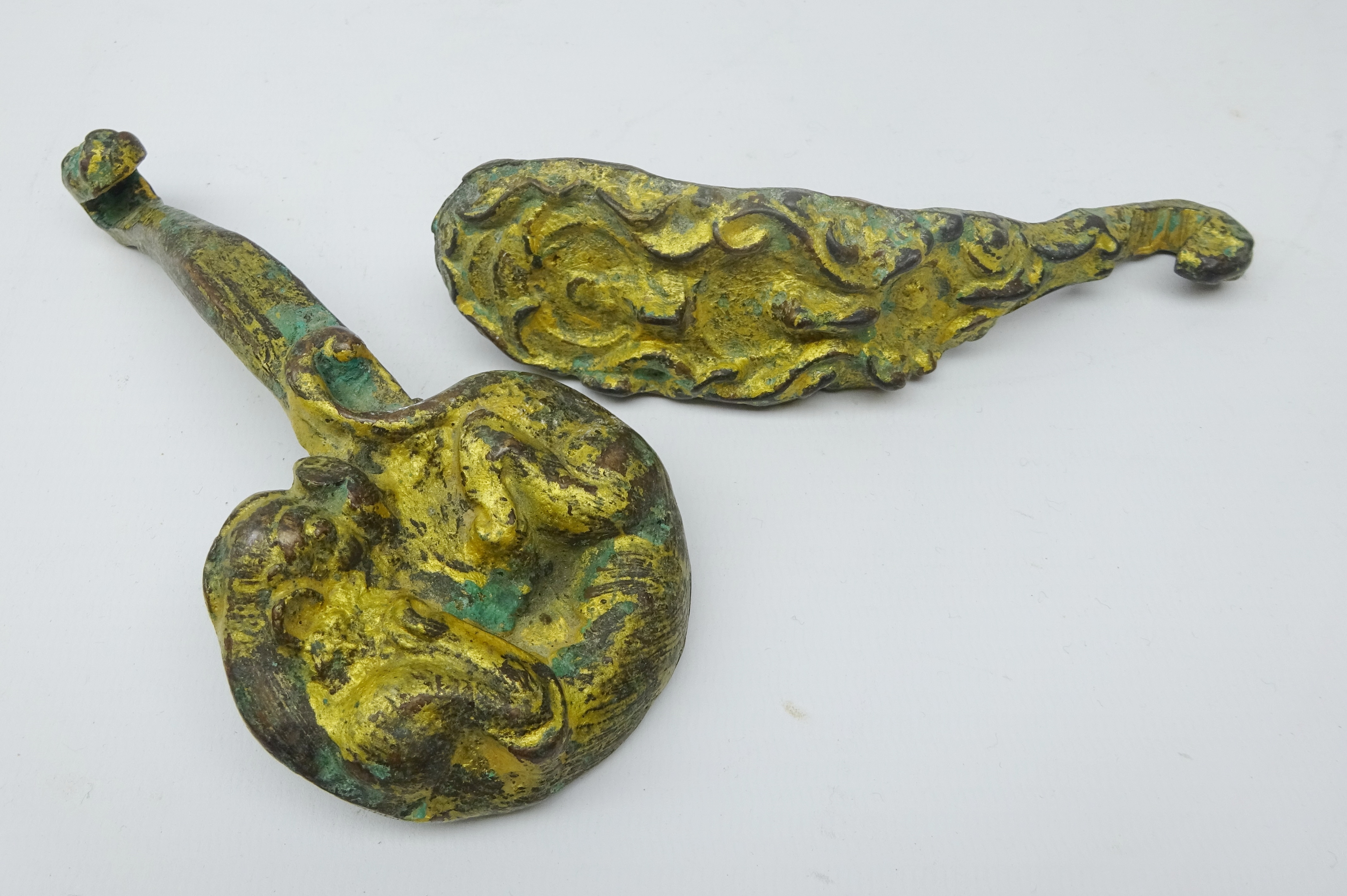 Two Chinese gilt bronze belt hooks with Archaic decoration,
