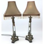 Pair Contemporary mirrored table lamps on trefoil base with beaded shades,