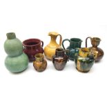 Collection of Dunmore pottery vases and jugs including a double gourd vase with textured glaze and