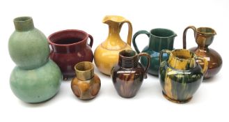 Collection of Dunmore pottery vases and jugs including a double gourd vase with textured glaze and