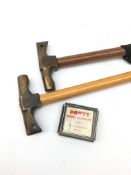 Two walking canes with Dowty bronze hammer head handles L84cm and a Dowty pocket tape measure in