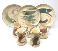 Five Yorkshire Moorlands Pottery Fish design spongeware jugs of tapered form,