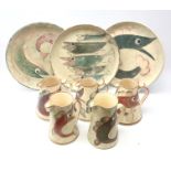 Five Yorkshire Moorlands Pottery Fish design spongeware jugs of tapered form,