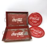 Two rectangular Coca-Cola advertising trays,