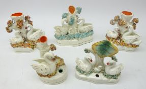 Victorian Staffordshire Swan decorated spill vases and pen stands,