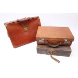 Vintage tan leather suitcase,