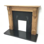 Art Nouveau cast iron fire inset with granite hearth and solid pine surround, W143m, H114cm,
