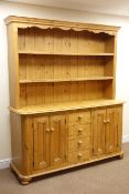 Waxed pine traditional dresser with raised two tier plate rack, projecting cornice,