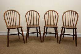 Set of four 20th century stick back Windsor chairs,