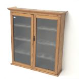 19th century pine cabinet, two glazed doors enclosing three shelves, W102cm H111cm,