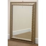 Ornate silver framed bevel edge wall mirror, W67cm,