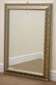 Ornate silver framed bevel edge wall mirror, W67cm,