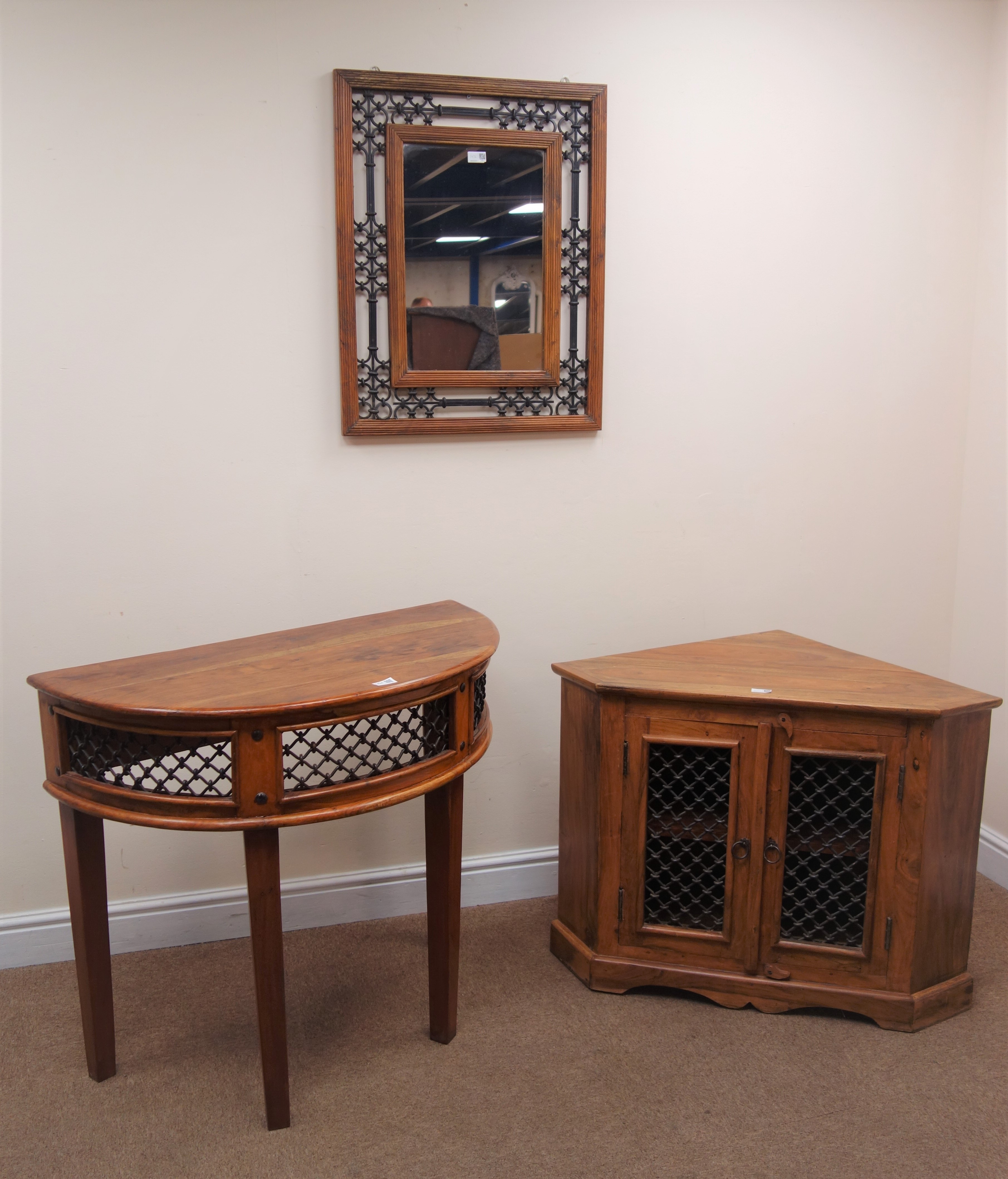 Rustic hardwood demi-lune console table, metal work detailing to frieze,