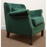Low backed armchair upholstered in studded emerald velvet, square tapering supports,