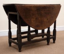 18th century oak oval drop leaf table, gate leg action, turned supports, W114cm, H71cm,