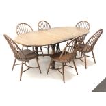 Ercol Golden Dawn finish elm extending oval dining table,