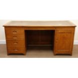 Early 20th century vintage oak twin pedestal office desk, leather inset top, panelled front,