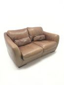 Two seat sofa upholstered in tan leather (W180cm) and matching armchair (W92cm) (2)