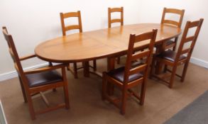 French solid oak oval extending dining table with two leaves,