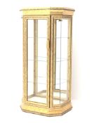 Gilt and marble display cabinet, canted corners, single door enclosing three glazed shelves, W50cm,