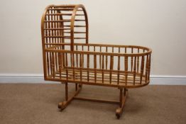Oak rocking crib, turned spindles with canopy to one end, W61cm, H98cm,
