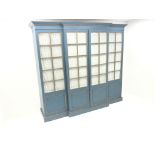 Large early 20th century breakfront four door wardrobe, projecting cornice,