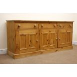 Solid pine dresser base, three drawers above three cupboards, plinth base, W183cm, H82cm,