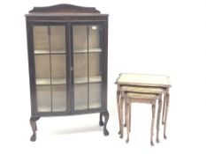 Early 20th century bow fronted mahogany display cabinet, two glazed doors enclosing two shelves,