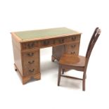 Georgian style yew wood twin pedestal desk, green leather inset top, nine drawers,