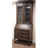 Early 20th century oak bureau bookcase, two glazed doors, three shelves,