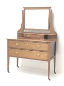 Edwardian inlaid mahogany dressing table, raised bevel edge mirror back,