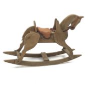 Early 20th century small pitch pine rocking horse, L111cm,