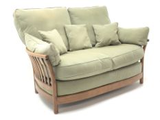 Ercol Golden Dawn finish elm two seat sofa (W145cm) a pair of matching armchairs (W90cm) and two