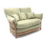 Ercol Golden Dawn finish elm two seat sofa (W145cm) a pair of matching armchairs (W90cm) and two