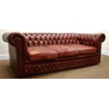 Three seat Chesterfield sofa upholstered in deep buttoned ox blood leather,