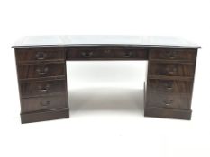 Georgian style mahogany shaped office desk, three piece leather inset top, eight drawers,