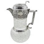 Edwardian silver mounted cut glass claret jug, relief decorated with scrolls and cartouche,