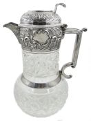 Edwardian silver mounted cut glass claret jug, relief decorated with scrolls and cartouche,