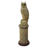 Selby Stone model of an Eagle Owl, on twist moulded circular column with stepped circular base,