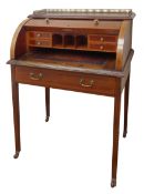 Edwardian inlaid mahogany cylinder front writing desk, with pierced brass galleried top,