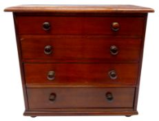 Victorian mahogany miniature chest of drawers, four graduated drawers on bun feet, H35cm,