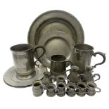 Georgian pewter single reeded circular dish, rim stamped DIM, D34cm, four later circular dishes,