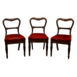 Set of three Gillows William IV rosewood balloon back dining chairs,
