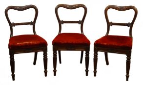Set of three Gillows William IV rosewood balloon back dining chairs,