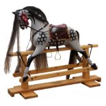 Early 20th century dapple grey rocking horse possibly Baby Carriages c1915,