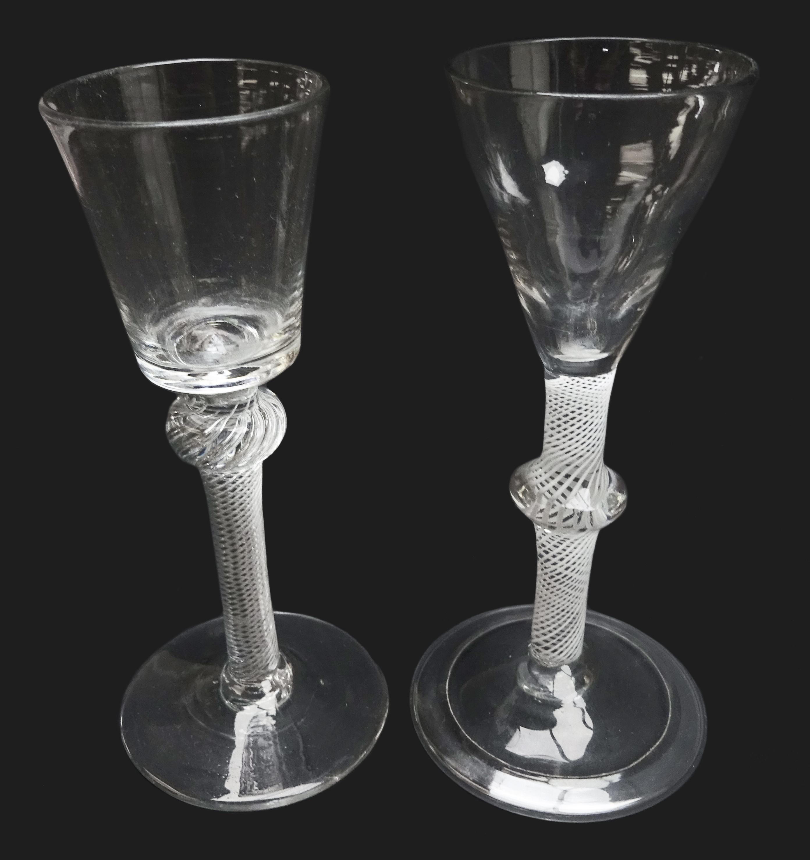 Georgian wine glass, bucket shaped bowl above a knopped air twist stem on conical foot, H15.